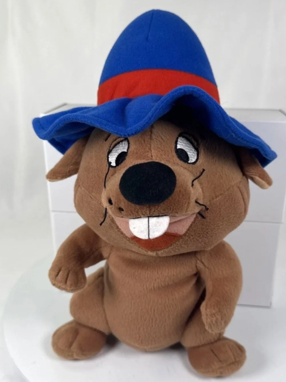 Tommy Nelson Brown Plush Dog Toy with Blue Hat and Red Band